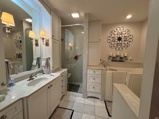 bathroom with an enclosed shower and vanity