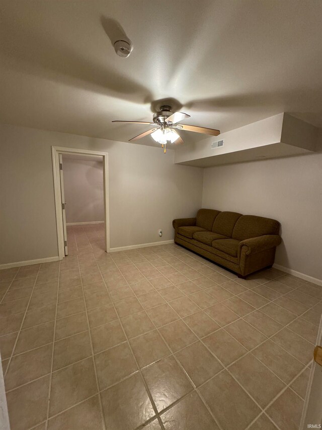 interior space featuring ceiling fan and light tile patterned floors