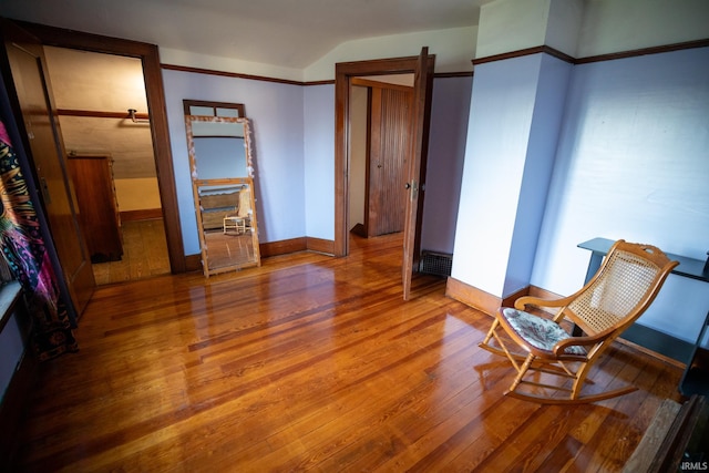 sitting room featuring hardwood / wood-style floors