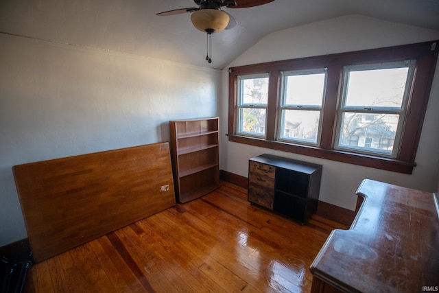 interior space featuring hardwood / wood-style floors, ceiling fan, and lofted ceiling