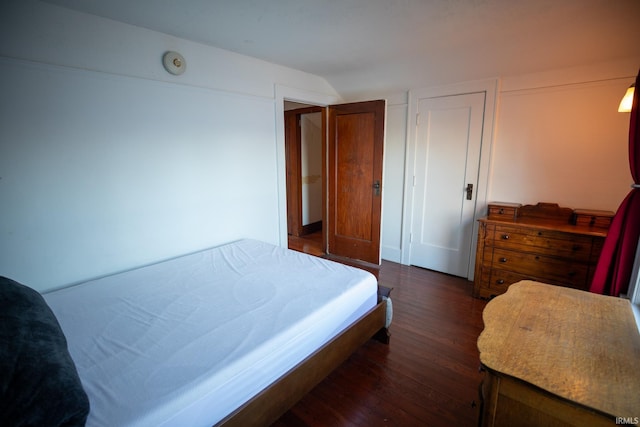 bedroom featuring dark hardwood / wood-style flooring