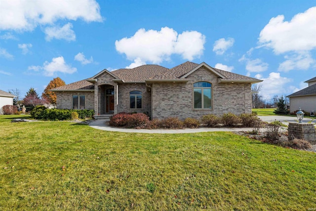 view of front of house with a front lawn