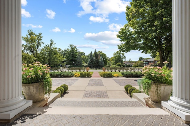 view of property's community featuring a patio