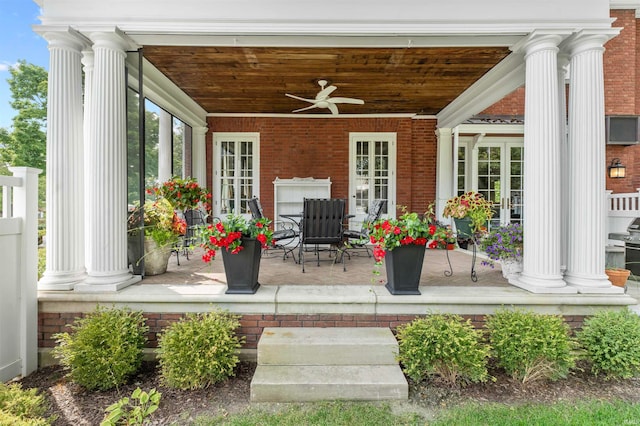 exterior space featuring ceiling fan