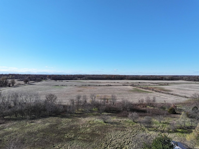 exterior space with a rural view