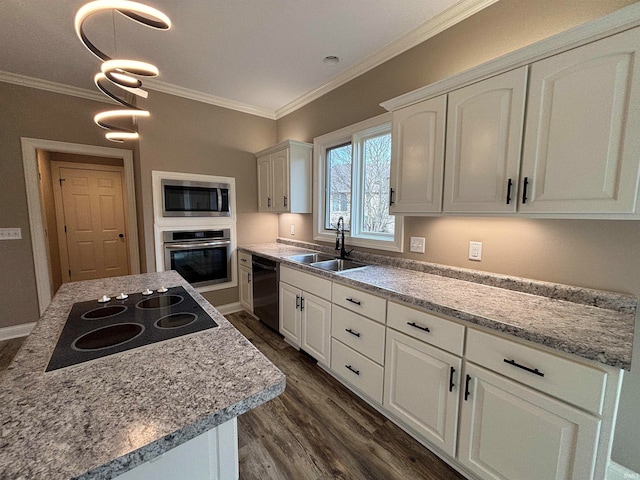 kitchen with black appliances, ornamental molding, dark hardwood / wood-style flooring, sink, and white cabinets