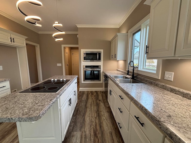 kitchen featuring black appliances, crown molding, white cabinetry, dark hardwood / wood-style flooring, and sink