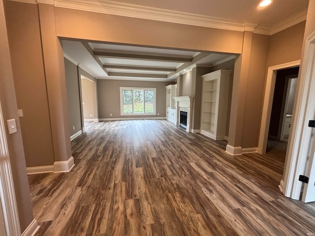 unfurnished living room with beamed ceiling, dark hardwood / wood-style flooring, and ornamental molding