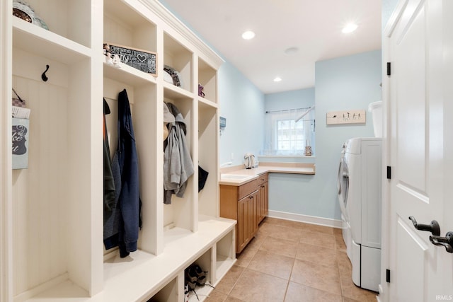 mudroom with light tile patterned flooring