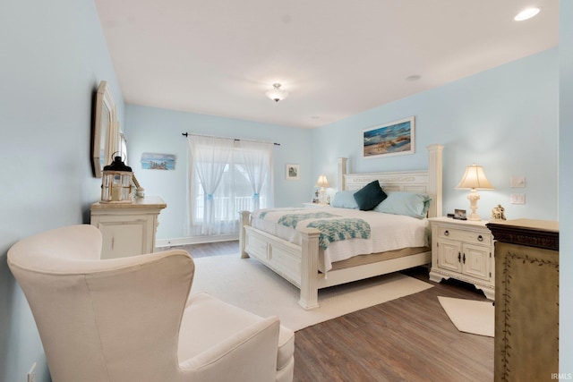 bedroom featuring light hardwood / wood-style floors