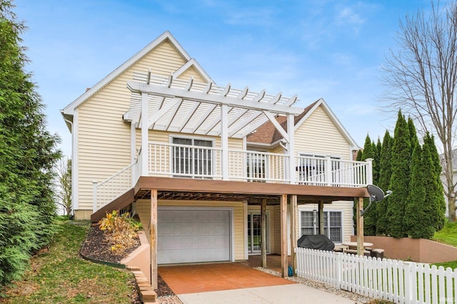 135 Ln 335 Lake James Ln, Angola, IN 46703 - view of front of property with an attached garage, driveway, and a pergola