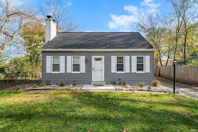 view of front of home with a front lawn