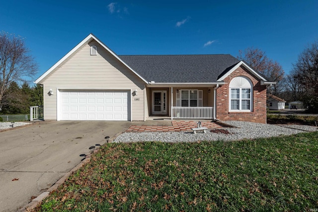 ranch-style house featuring a garage and a porch