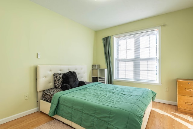 bedroom featuring light hardwood / wood-style floors