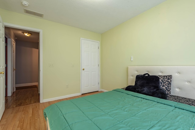 unfurnished bedroom featuring light hardwood / wood-style flooring