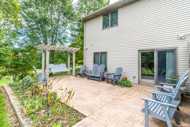 back of house with a patio and a pergola