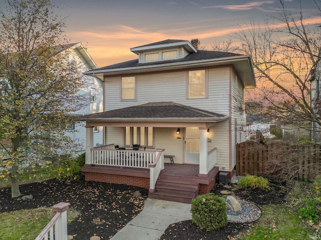 view of front of property featuring covered porch