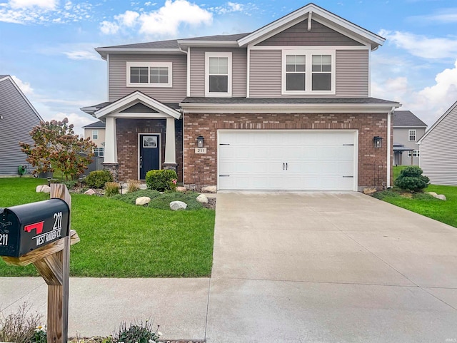 view of front facade featuring a front yard and a garage