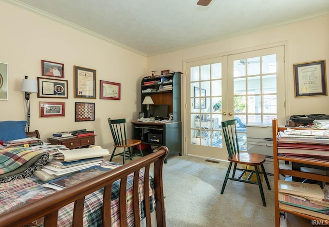 carpeted home office with french doors, a textured ceiling, and crown molding