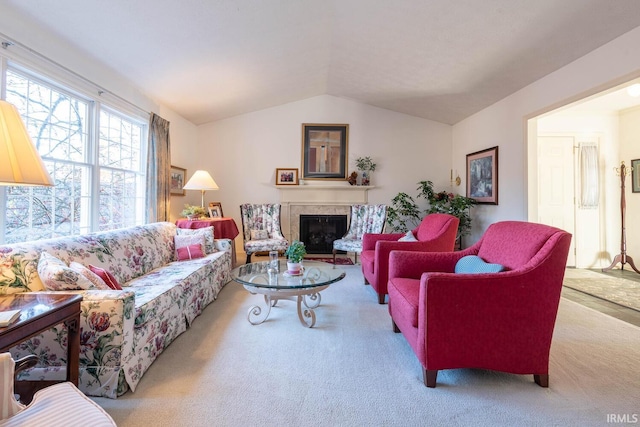 living room featuring light carpet and vaulted ceiling