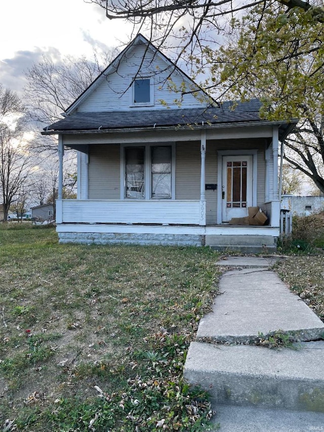 bungalow featuring a porch