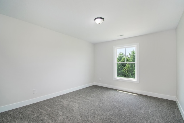 unfurnished room featuring carpet flooring