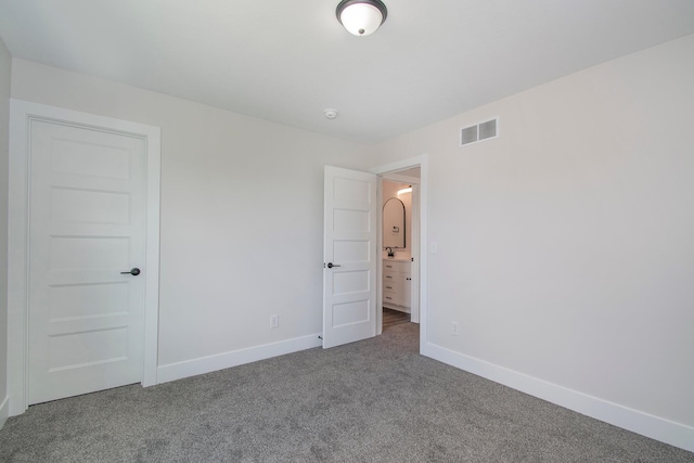 unfurnished bedroom featuring carpet flooring