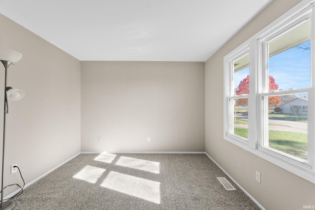 view of carpeted spare room