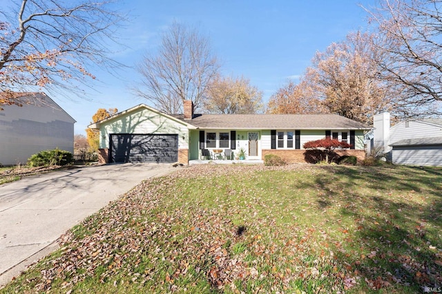 single story home with a garage and a front lawn