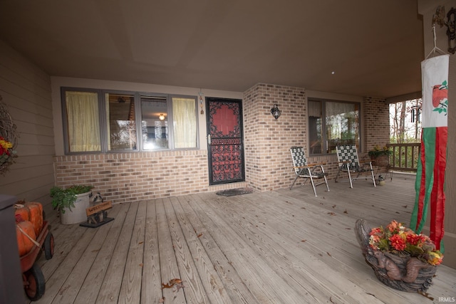 wooden terrace with covered porch