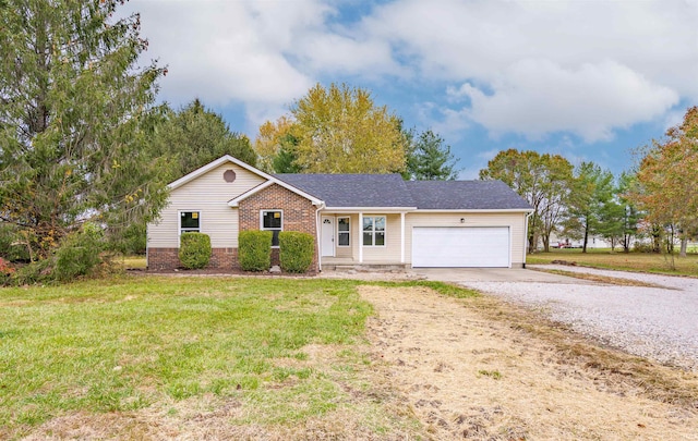 ranch-style house with a garage and a front lawn