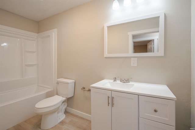 full bathroom featuring wood-type flooring, vanity, toilet, and shower / washtub combination