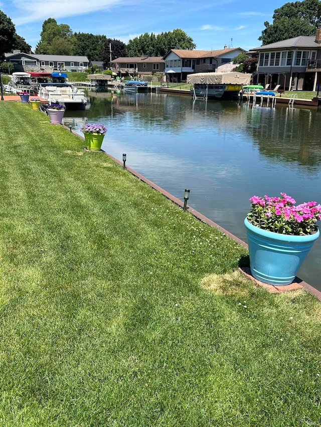 property view of water featuring a dock