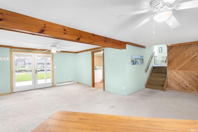 unfurnished living room featuring carpet flooring, ceiling fan, french doors, a baseboard radiator, and washer / clothes dryer