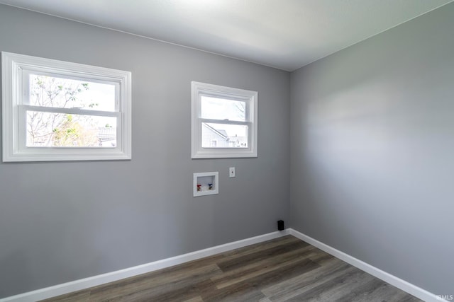 washroom featuring washer hookup, plenty of natural light, and dark hardwood / wood-style floors