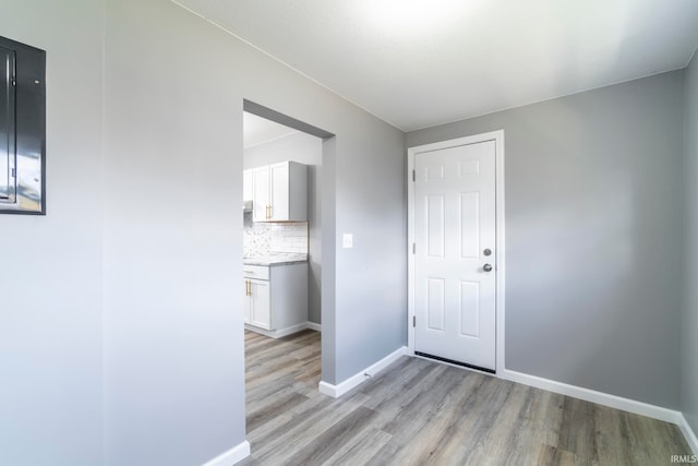 interior space with light hardwood / wood-style flooring