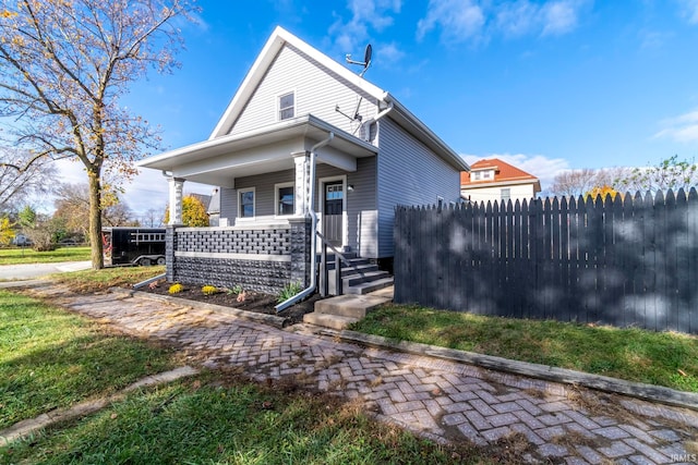 bungalow-style home featuring covered porch