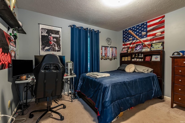 carpeted bedroom featuring a textured ceiling