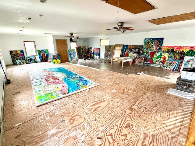 recreation room featuring hardwood / wood-style flooring