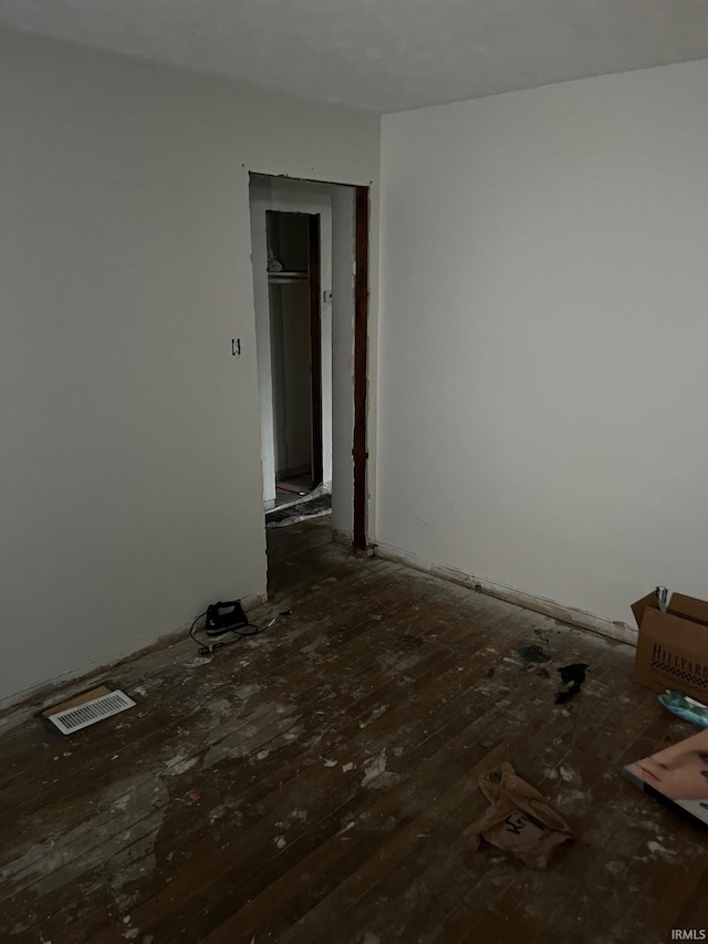 1614 N Johnson St, South Bend, IN 46628 - unfurnished room featuring wood-type flooring