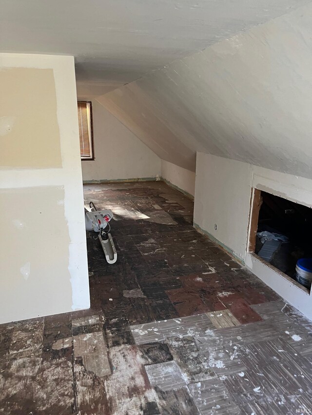 bonus room with lofted ceiling