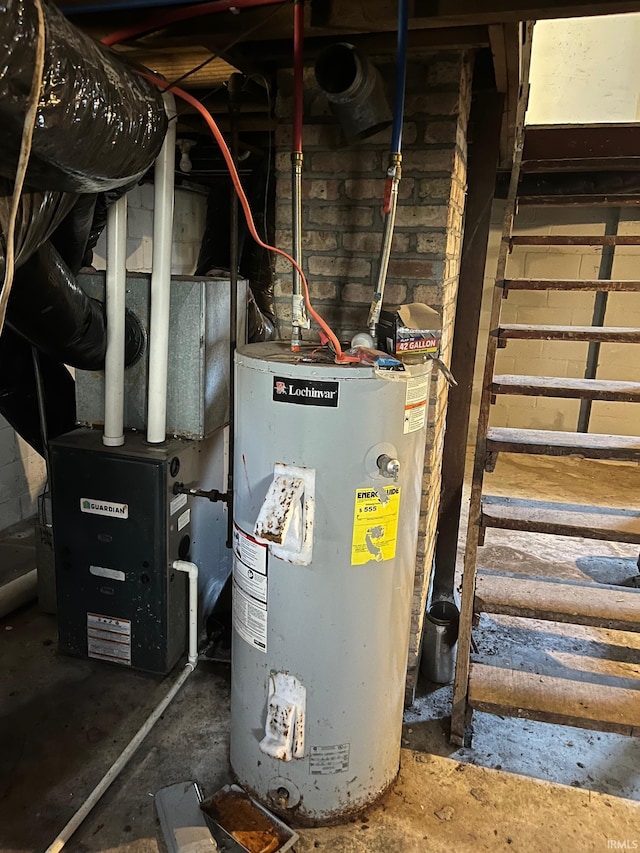 1614 N Johnson St, South Bend, IN 46628 - utility room featuring water heater