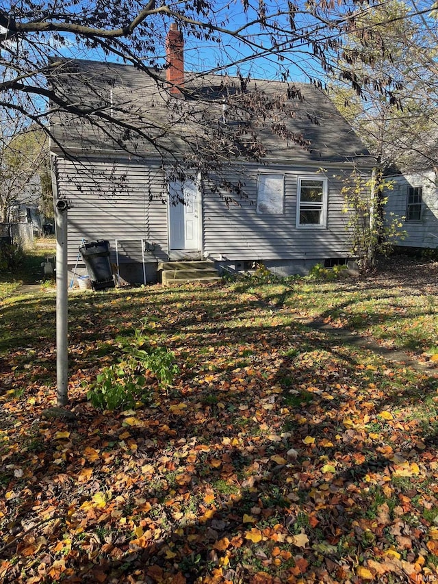 1614 N Johnson St, South Bend, IN 46628 - back of property with a chimney