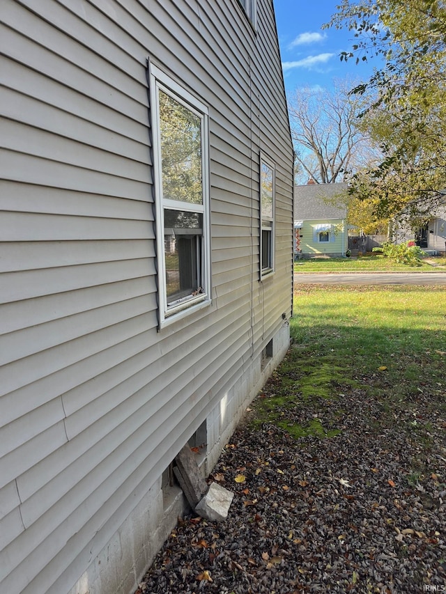 1614 N Johnson St, South Bend, IN 46628 - view of property exterior featuring a yard and crawl space