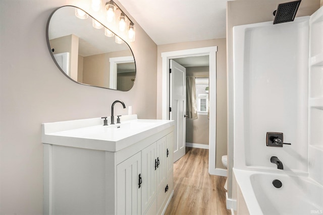 full bathroom featuring vanity, shower / bathtub combination, toilet, and wood-type flooring