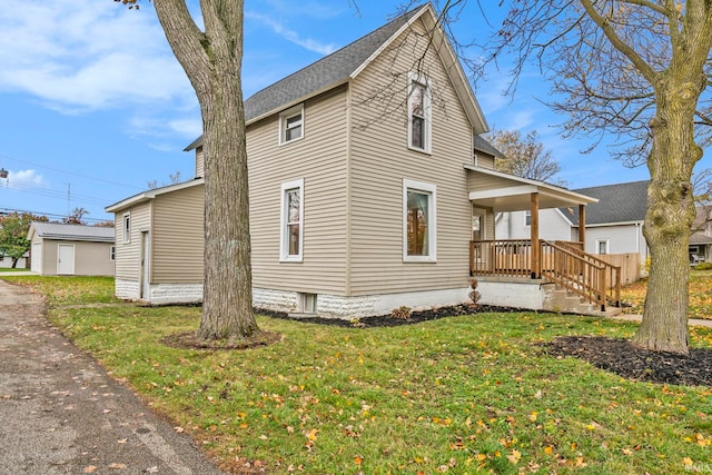 view of home's exterior with a yard