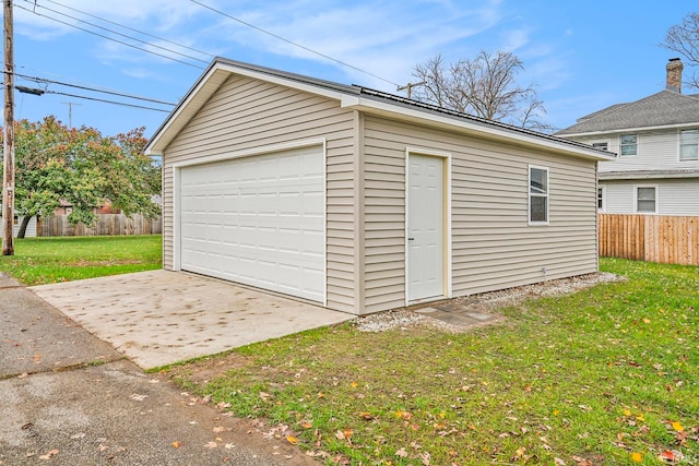 garage with a lawn