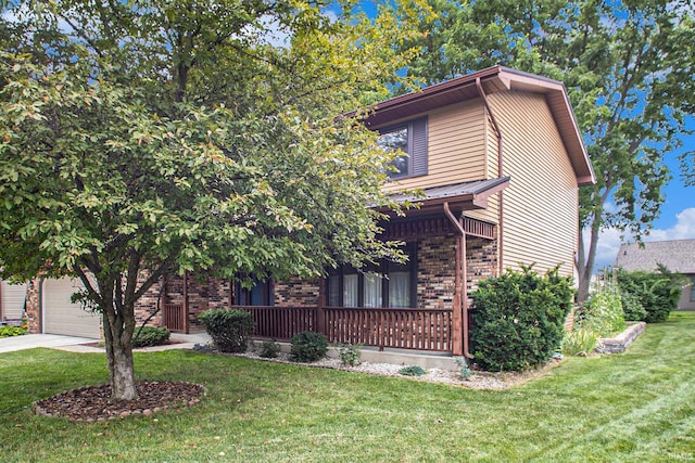 view of front facade with a garage and a front lawn