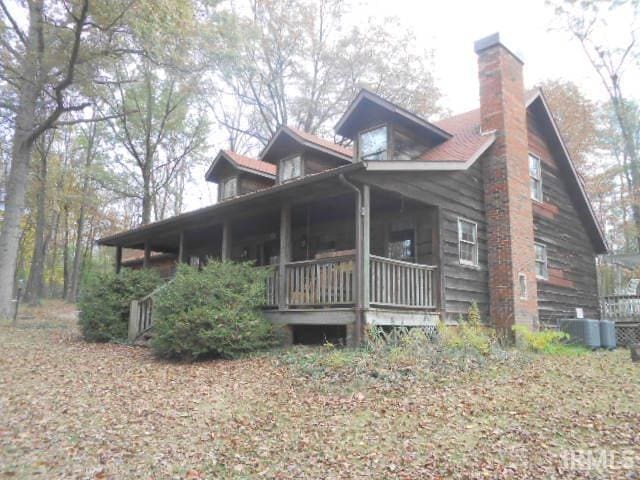 view of home's exterior featuring a porch