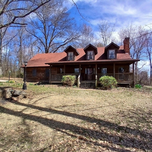 105 Jacob Orch, Odon, IN 47562 - view of front of house with a chimney and covered porch